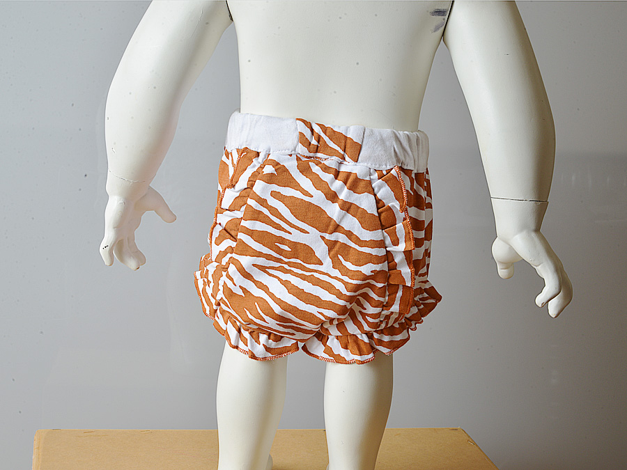 diaper cover. burnt orange zebra prints