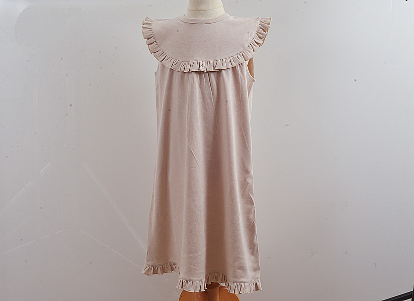 girl toddler, sleeveless dress, Almond Milk color.
